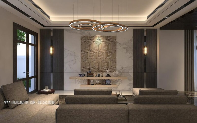 Bố trí phòng khách hiện đại ấn tượng với đá ốp tường cao cấp cùng họa tiết 3D độc đáo. Thiết kế nội thất phòng khách biệt thự
