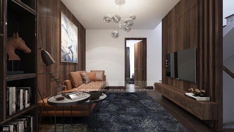 Điểm nhấn sofa da màu cam ấn tượng cho phòng khách hiện đại trang trí tường từ gỗ ốp tối màu.